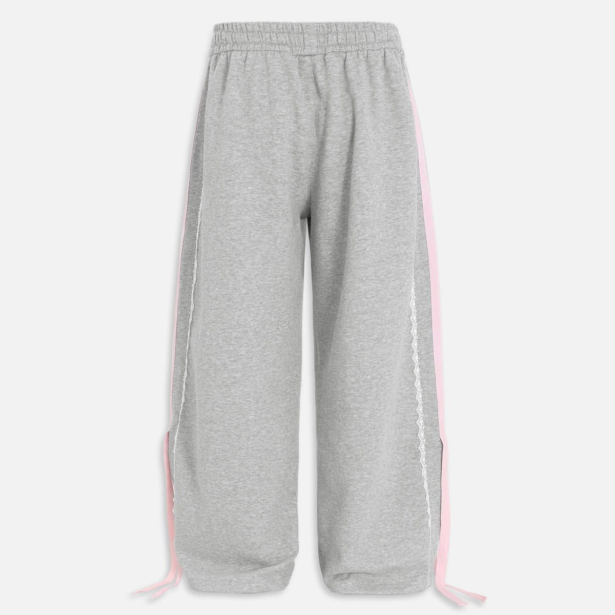 Pantalón baggy con bandas rosas y lazos laterales