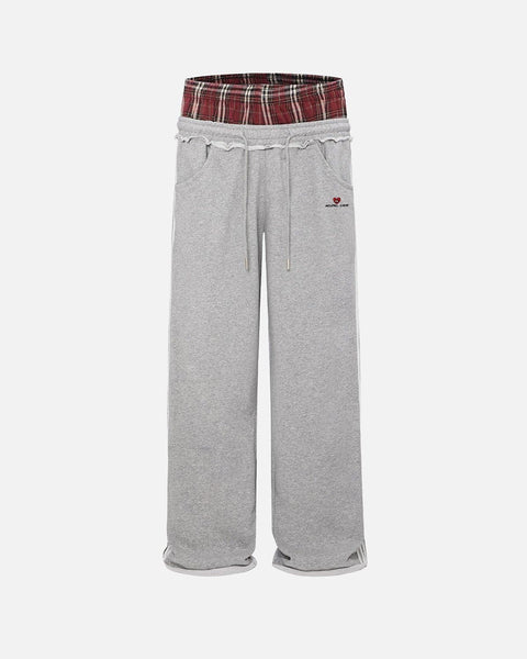 Pantalón ancho relajado con cintura contrastada