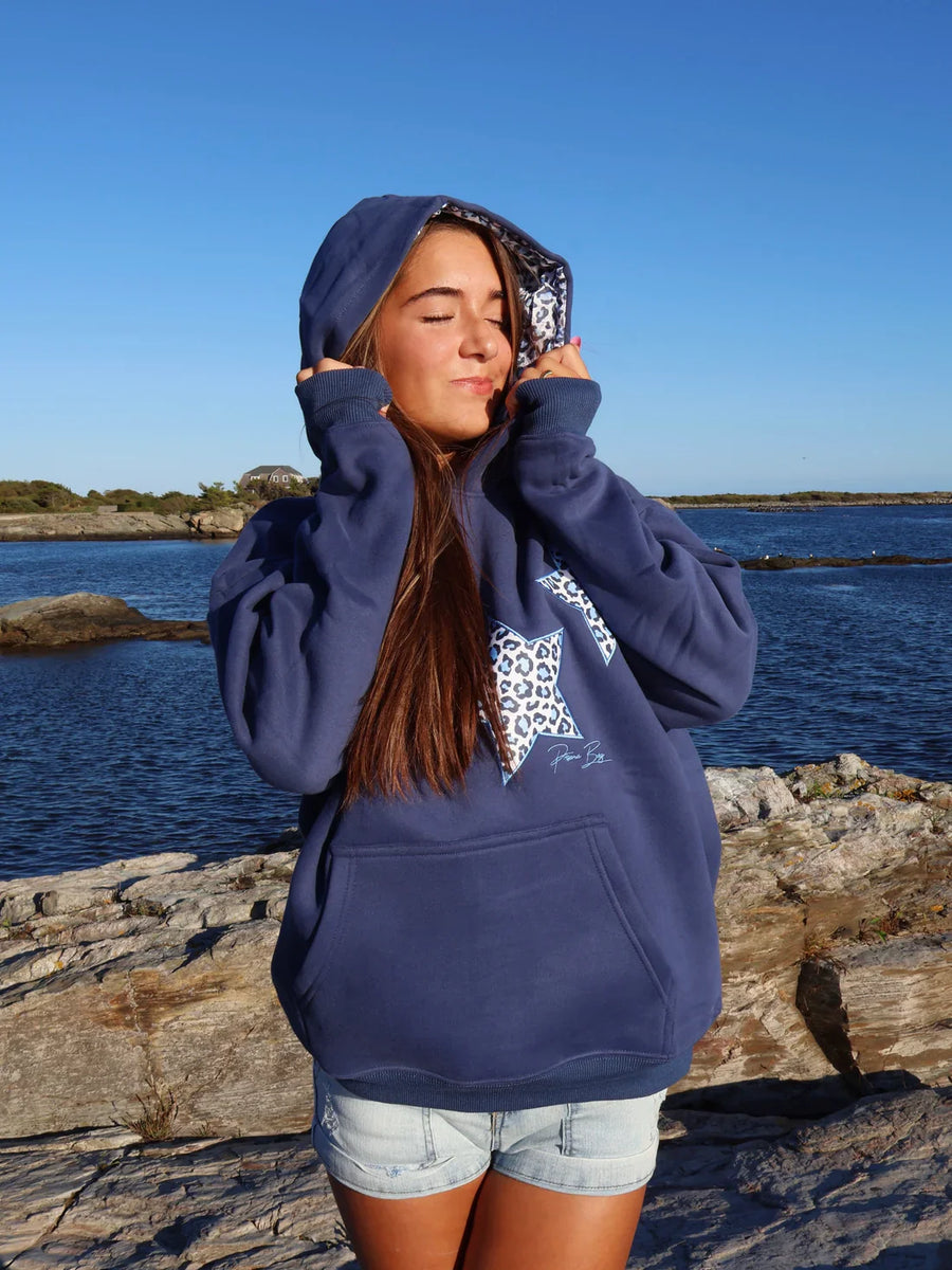 Sudadera con capucha y estrellas animal print