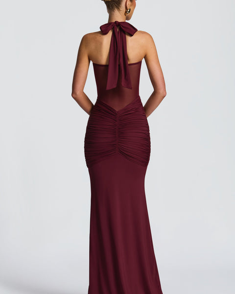 Vestido largo burdeos con espalda descubierta y drapeado